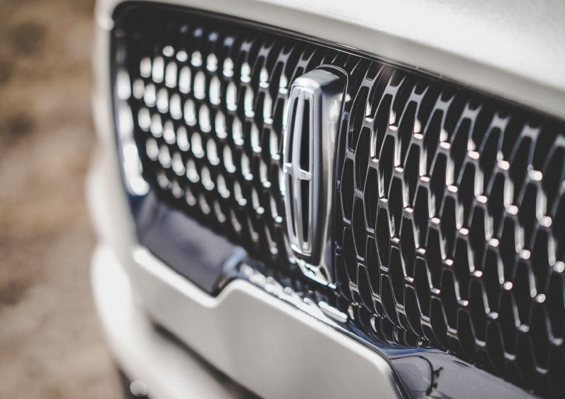 The grille of the 2024 Lincoln Aviator® Reserve model with an eye-catching repeated field of Lincoln Star logo shapes | Brinson Lincoln of Corsicana in Corsicana TX