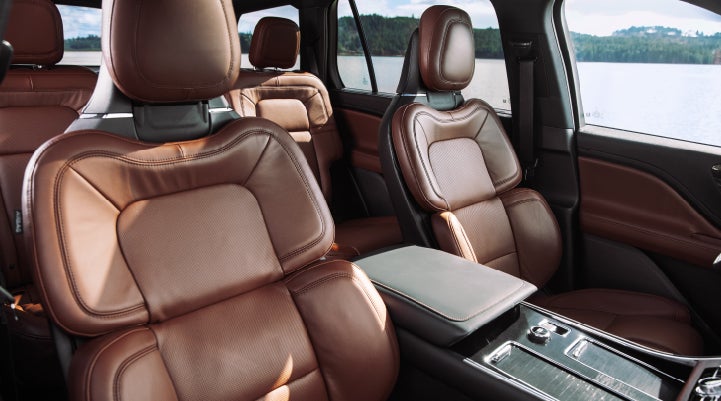 The front row's Perfect Position Seats in a 2024 Lincoln Aviator® Reserve model with Ebony Roast interior | Brinson Lincoln of Corsicana in Corsicana TX